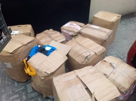 Packages of used football kits donated by the Westdyke Community Club